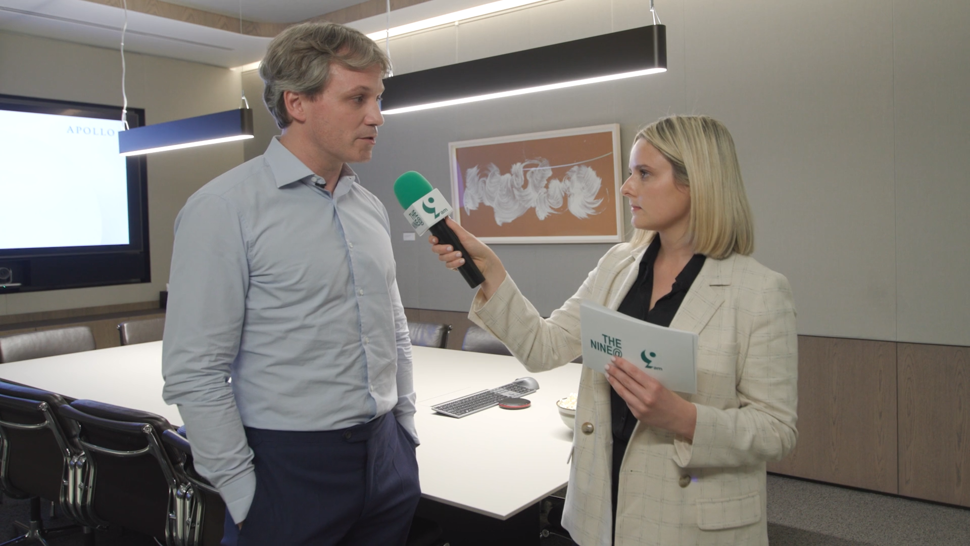 A woman interviews Alex Humphreys, Partner in Apollo’s Financial Institutions Group, in the Apollo London office.